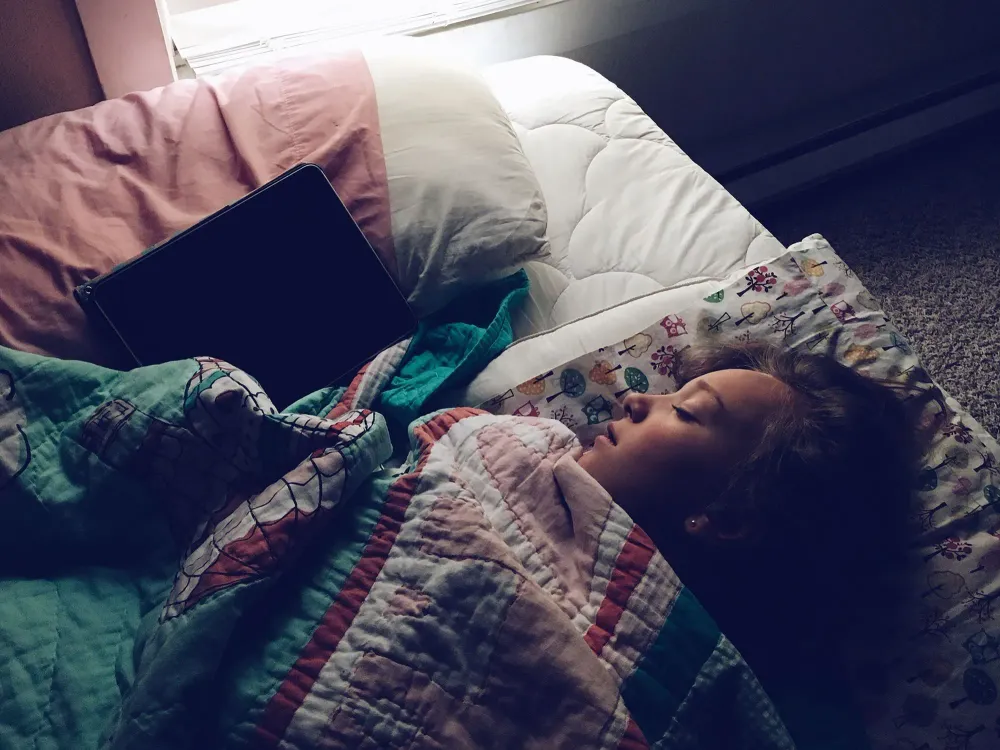 woman sick in bed